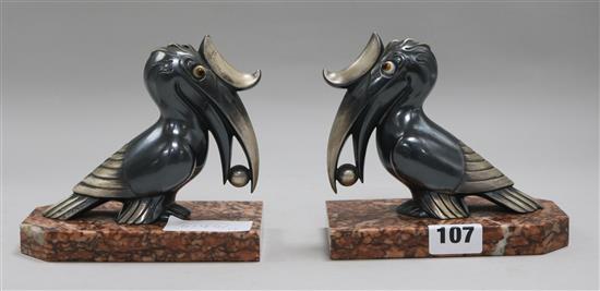 A pair of French toucan bookends, signed Franjou
